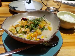 Lentils with vegetables in coconut milk and curry sauce  at Justo Restaurant in Medellin