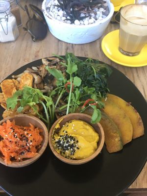 Build your own meal - BBQ tempeh, sautéed spinach and mushrooms, roasted pumpkin, fermented carrot, and turmeric hummus. at Two Trees Eatery in Tibubeneng