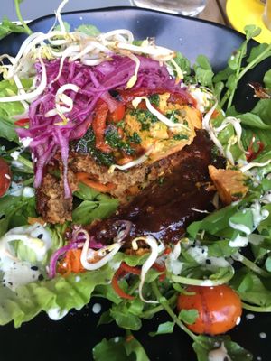 the bun-less vegan burger - patty made with mushrooms and tempeh. delicious. at Two Trees Eatery in Tibubeneng