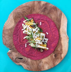 Beet wrap with tofu steak and salad! at BBVegan in Chichester