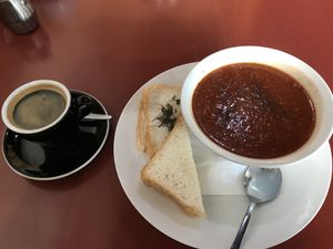 Americano and tomato & basil soup with bread (no dairy) at Bonzai Cafe in Greymouth