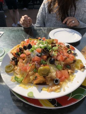 Fully loaded nachos - huge with every topping you need! at Hemingway's By The Bay in Outlying Islands
