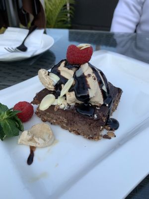 Vegan dessert - chocolate brownie with salted caramel happy cow ice cream  at Hemingway's By The Bay in Outlying Islands
