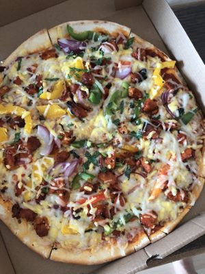 Vegan Chicken pizza was very good! It looks not good, but very good:)  at Hemingway's By The Bay in Outlying Islands