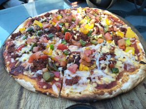 Chipotle pizza at Hemingway's By The Bay in Outlying Islands
