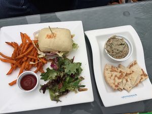 pulled jackfruit burger (with sweet potato fries and side salad) and babaganoush dip at Hemingway's By The Bay in Outlying Islands