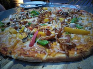 Jackfruit pizza at Hemingway's By The Bay in Outlying Islands