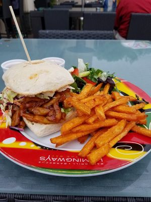 Fries and salad are good, but jack fruit sandwich not at Hemingway's By The Bay in Outlying Islands