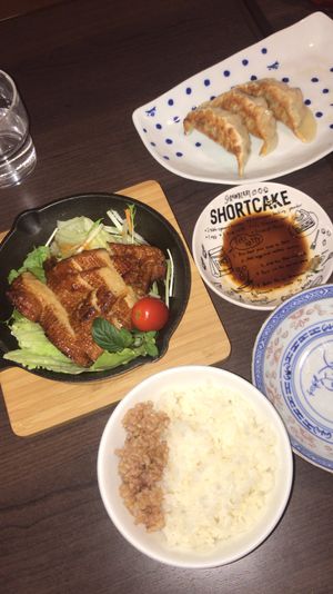 Grilled soy chicken in black pepper sauce and gyoza at Veggie House in Chiba