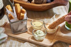 Fried Tempeh with Three Mayo-Based Dips

Quantitatively delicious (for 2 pax): Energy 983 kcal | Fat 71 g (Saturated Fat 16 g, Cholesterol 0 g) | Carbohydrate 58 g (Fibre 1 g, Sugar 30 g) | Protein 43 g | Sodium 1,959 mg

Qualitatively enjoyable: This dish is originally created for children who are fond of deep-fried finger foods. Fortunately, this dish is rich in protein from tempeh. Our three vegan dips include greenish Wasabi-Mayo, which is fairly pungent; yellowish Passion-Mayo, which tastes slighty sour and sweet; and amber Miso-Mayo, which is savoury and nutty. Healthy eaters should eat our calorie-rich dips as appropriate.

165 THB at Tonklar Facai - Siriraj in Bangkok