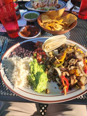 Smoked tofu and seitan fajitas. Salsa and chips in the background (not complimentary, but worth it!) at Cantina Los Caballitos in Philadelphia