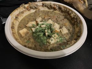 Spicy coconut lentil soup  at Clover Food Lab - Central in Cambridge