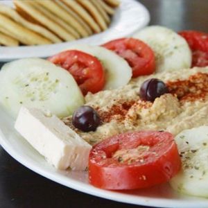 Hummus platter is vegetarian. Omitting the feta makes it vegan. SUPER good hummus!  at Kafe Neo in Mill Creek