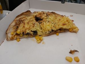 Vegan pizza with vegan cheese topping at Zarzuela in Lisbon