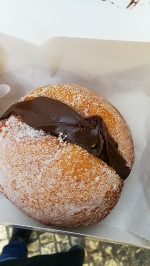 Bolo de Berlin filled with chocolate. Amazing at Zarzuela in Lisbon