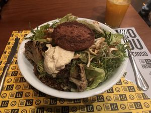 Salad with burger at Lanchonete da Cidade - Jardins in Sao Paulo