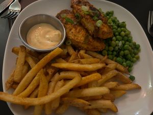 Vegan peri chicken filets, green peas and fries  at Crazy Bastard in Berlin