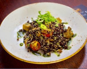 Siliken tofu,wild rice, quinoa, shallots,coriander,cherry Tom saldad at Cafe Nowa in Petersham