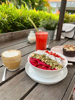 Hipsta Bowl, cappuccino with soy milk, watermelon juice and snickers muffin - all vegan  at Crate Cafe in Canggu