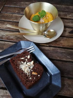 Brownie (chocolate) and a pumpkin mousse with coconut. The brownie is delicious, simple but tasty, and the pumpkin mousse is a surprise : it is so sweet !!! at 108 Eatery in Ho Chi Minh City