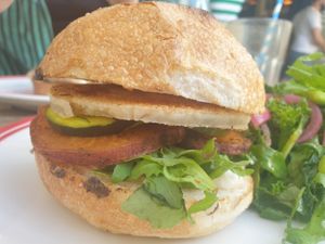 Vegan roll with vegan halloumi and a side salad. at The Copper Mill in Alexandria