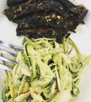 Twisted Bella- Raw lemon garlic cashew cream zucchini noodles with marinated portobello mushroom.  at Juice Amour in Middlebury