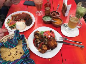 Stuffed friet banana and stuffed bell pepper  at Jardin La Reserva Restaurante in San Cristobal De Las Casas