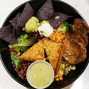 Aztec power bowl with brown rice base and tempeh chunks as the protein. at Copper Branch in Waterloo