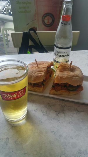 Tried the Smoked Maple Tempeh Sandwich this visit... I took the train so I washed her down with a Mill Street! All of the above were great choices! at Copper Branch in Waterloo