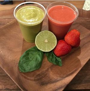 BAS-A-LOUPE SMOOTHIE - (green smoothie):  
Coconut milk, nut milk, basil, avocado, cantaloupe, banana, lime.

SOUR PATCH SMOOTHIE (red smoothie):  
Hibiscus tea, watermelon, strawberry, mango, honey (can be substituted for several other vegan sweeteners) at Backbone Cafe in Sacramento