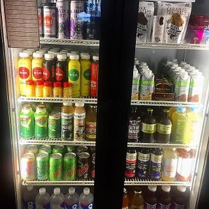 Lots of beverages for sale at Backbone Cafe (kombucha, coconut water, CBD water, acai drinks, protein shakes)  at Backbone Cafe in Sacramento