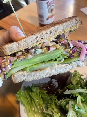 Vegan hot pastrami (featuring roasted broccoli and pickled mustard seeds) 🤤  at Peloton Cafe in Seattle