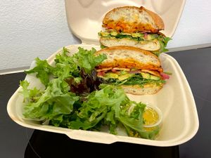 cold cut sandwich w/tofu bacon + salad (takeout) at Peloton Cafe in Seattle