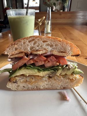 Loaded vegan breakfast sandwich.  at Peloton Cafe in Seattle