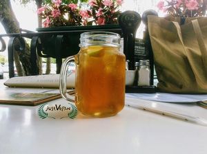 Sugar free apple & gooseberry ice tea, deliciously refreshing, lovely relaxing outside section. Lovely working environment for us workaholics, WiFi is available.    at Mugg & Bean - Lonehill in Johannesburg
