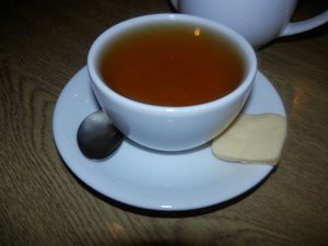 Peppermint tea with vegan/gluten free biscuit at Penelope's Cafe  in Dereham