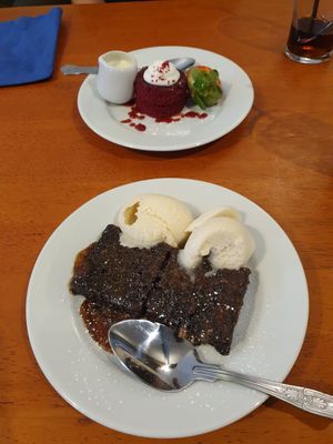 Red velvet cake and salted caramel brownie with vegan vanilla ice cream at The Saltwater Inn in Porthcawl