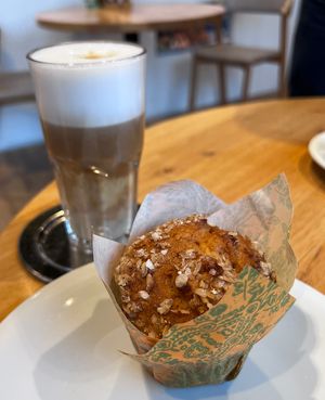 apple cinnamon muffin & latte macchiato with oat milk   at Kaisers Gute Backstube in Loerrach