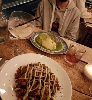 Roasted Cauliflower, with cheakpeas and green tahin. And pie + mash. at The Spread Eagle in East London