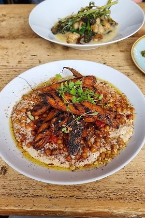 Carrot, muhummara sauce, butterbean mash, crispy chickpeas at The Spread Eagle in East London