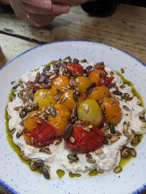Confit tomatoes with almond ricotta at The Spread Eagle in East London