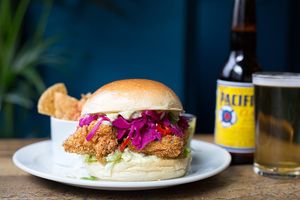 Tofish finger sandwich with beer battered tofish, pickled cabbage, tartare sauce and deep fried capers
 at The Spread Eagle in East London