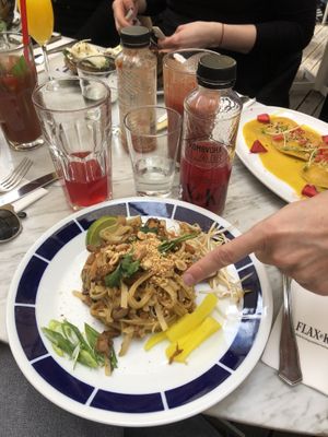 Pad thai on the left and the filled pasta with pumpkin puree on the right  at Flax & Kale - Sant Pere Mes in Barcelona