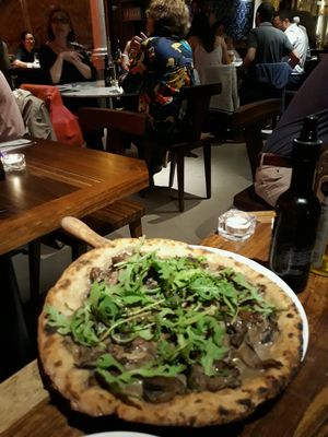 Vegan Pizza with mushrooms and Truffle. at Flax & Kale - Sant Pere Mes in Barcelona