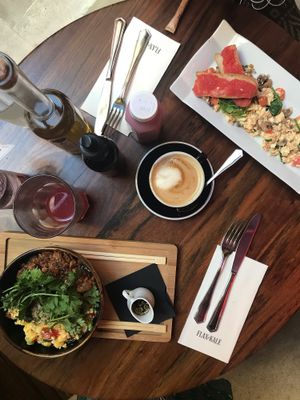 My Japanese girlfriend bowl and scrambled tofu with juice and oat latte  at Flax & Kale - Sant Pere Mes in Barcelona