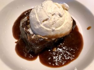 Toffee pudding with vegan vanilla ice cream. at The 13th Note in Glasgow