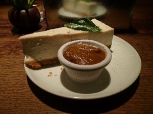 The delicious cheesecake with toffee sauce. at The 13th Note in Glasgow