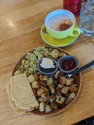 Breakfast tofu scramble with potatoes and toast, and vegan chai ☕ at Great Full Gardens - South in Reno