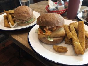Nashville and the Kimchi burger, with polenta fries! Delicious! at The Blacksmith & The Toffeemaker in London
