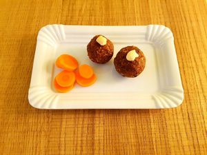 Carrot Laddu. Made with Carrort, Coconut, sugar & ghee. I  at Veg-Out in Amsterdam